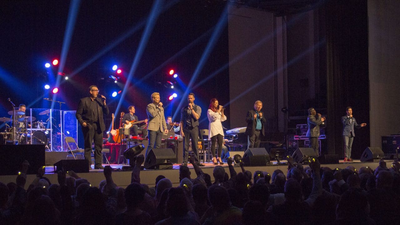 Gaither Vocal Band with guest artists Gene McDonald and Charlotte Ritchie on stage together at Mayo Civic Center