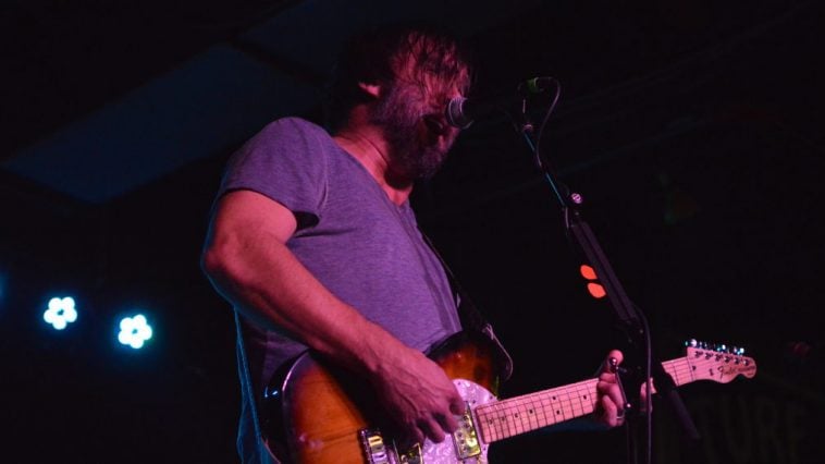 Chris Simpson of Mineral sings and plays guitar