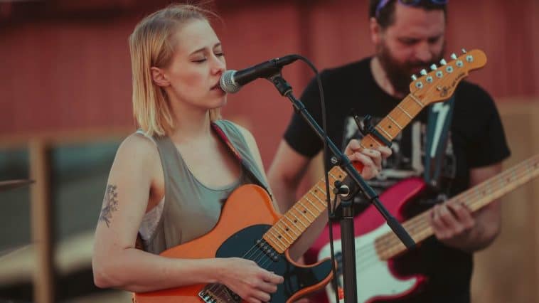 Woman playing guitar
