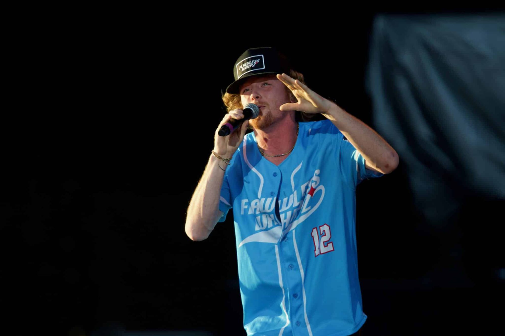 Bailey Zimmerman performing on stage. Bailey Zimmerman's net worth