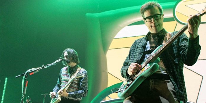 the band weezer performing on stage