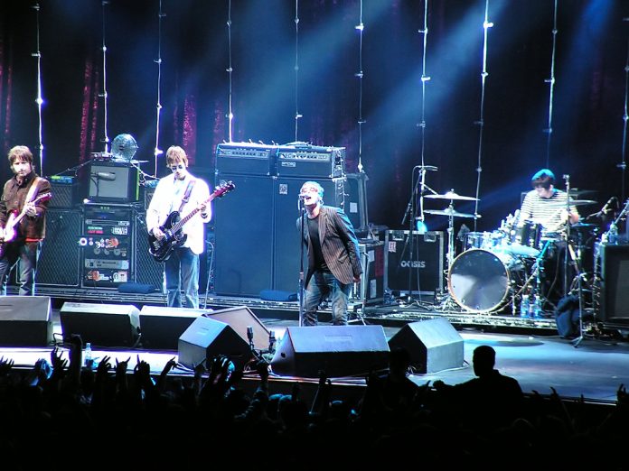 band oasis performing on stage
