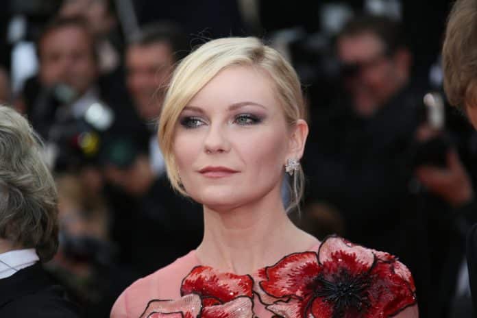 celebrities who were drug addicts kirsten dunst on the red carpet in a red dress