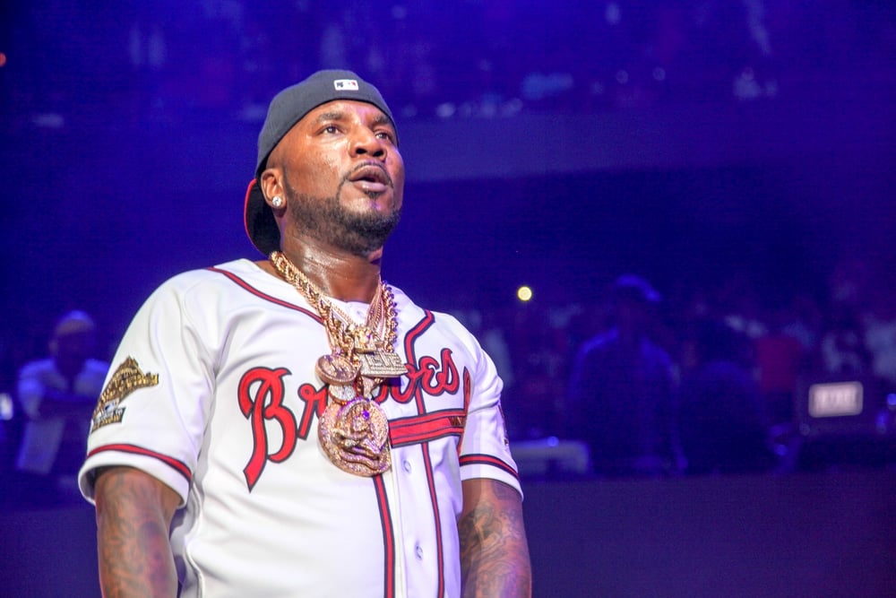 famous rappers who have duis young jeezy on stage performin in a baseball jersey