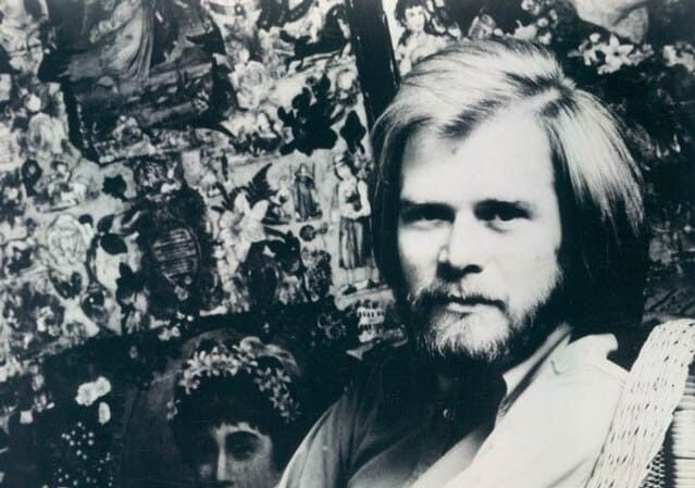 tall musicians long john baldry sitting in a chair in 1972