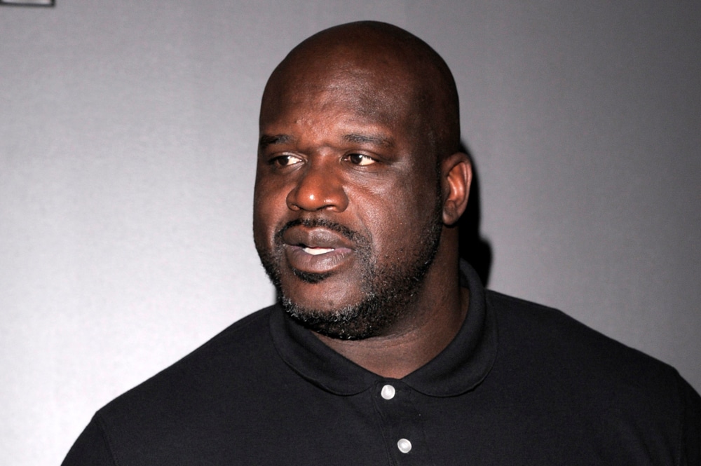 celebrities who are taller than you expected shaquille o neal, shaq in a black shirt