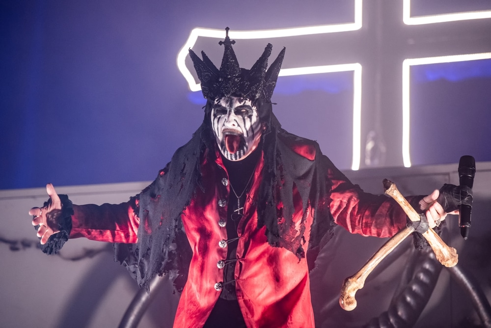 tall musicians sweedish rock band mercyful fate performs on stage in costume