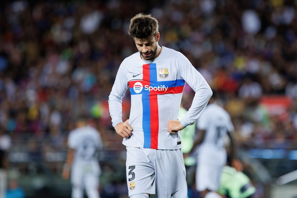 gerard pique in a soccer uniform on the field shakiras husband