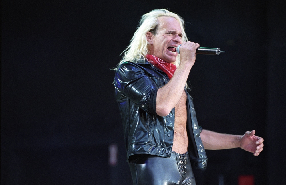 david lee roth's net worth david lee roth singing on stage in a leather jacket