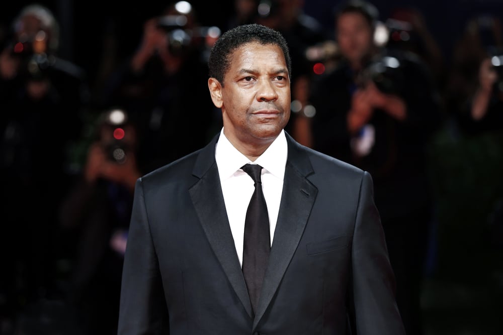celebrities who are taller than you expected denzel washington arriving at an event in a black suit