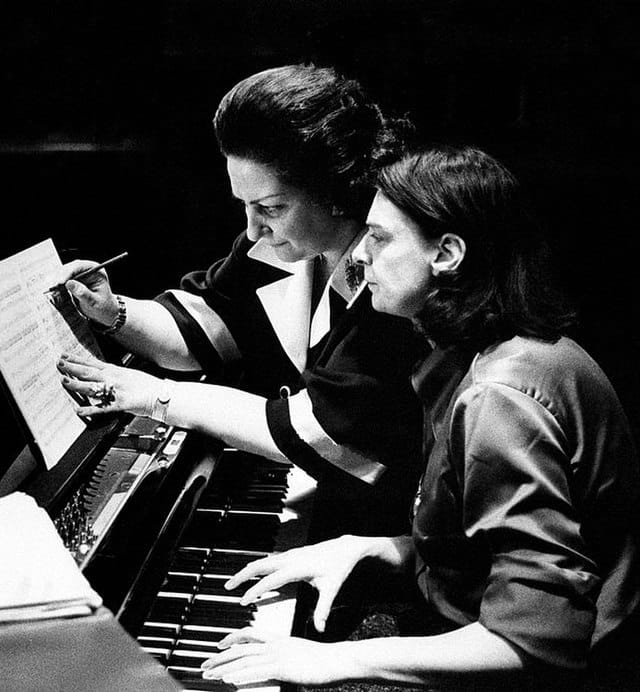 singer montserrat caballe working on music at a piano with a pianist. Montserrat Caballé's net worth.