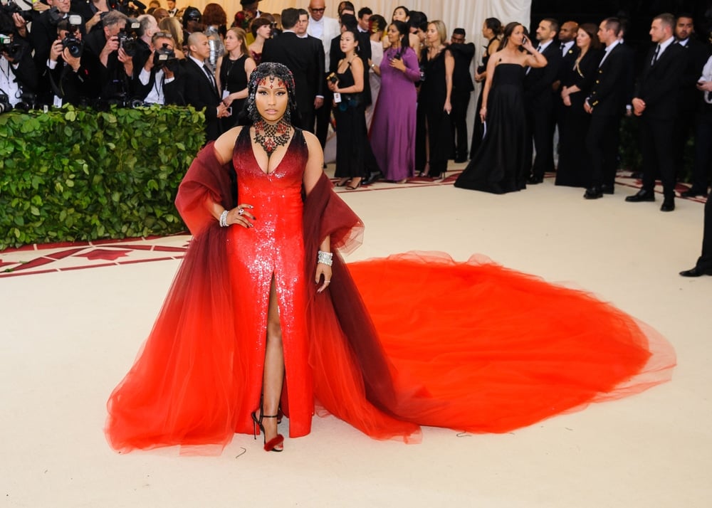 nicki minaj nicki minaj arriving for the met gala in a red dress