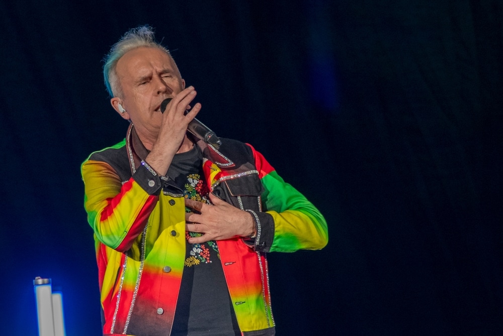 howard jones performing in a colorful jacket