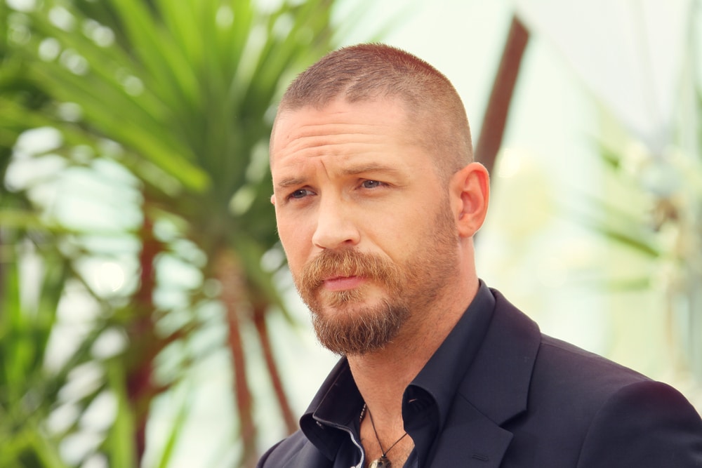 tom hardy arrives at an event